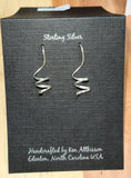 Ken’s handcrafted jewelry - Sterling Silver push through swirl ER461