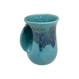 Clay in Motion - The Original Handwarmer Mug: Cobalt Canyon / Left Hand