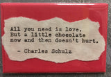 - Charles Schultz Quote Fridge Magnet "All you need is love..": Black