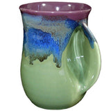 Clay in Motion - The Original Handwarmer Mug: Black and Brown / Left Hand
