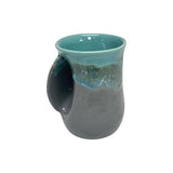 Clay in Motion - The Original Handwarmer Mug: Black and Brown / Left Hand