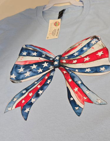 Light Blue Tee Shirt with Red White and Blue Ribbon by Local Artist Michael