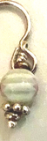 MKD Light Green Bead with Red Centered Flower