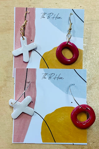 X0 clay earrings by Barbie one per purchase