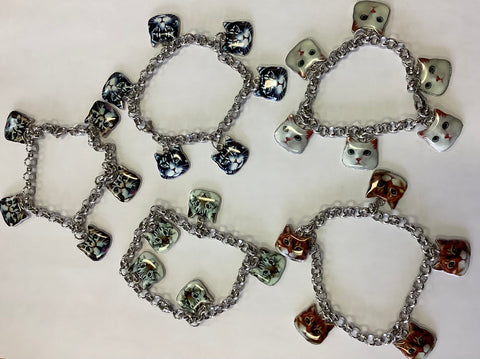 Cat head charm bracelets by Jen G